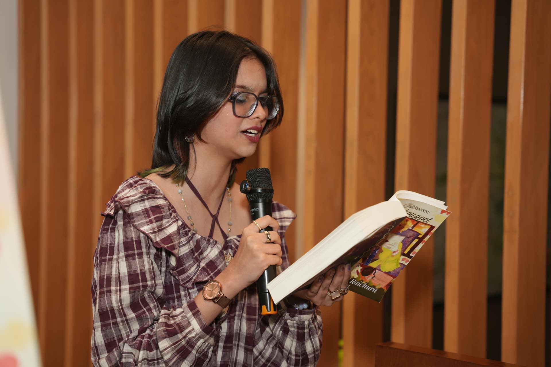 Reading an excerpt from the book.
