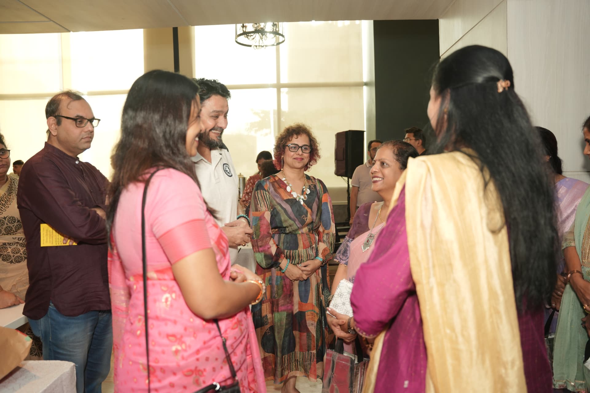 Conversation and warmth filling the evening.