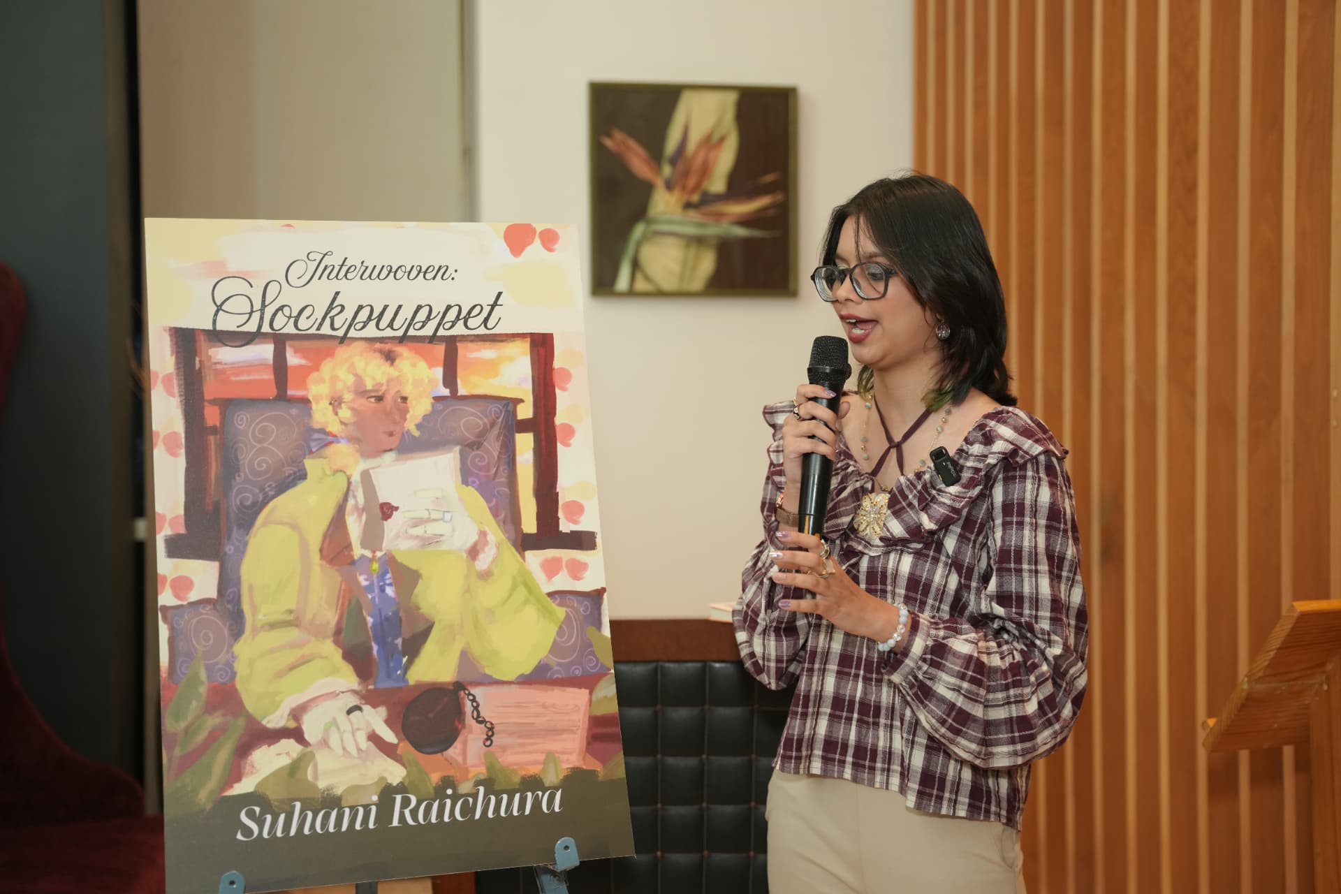 Suhani addresses the room at the launch.