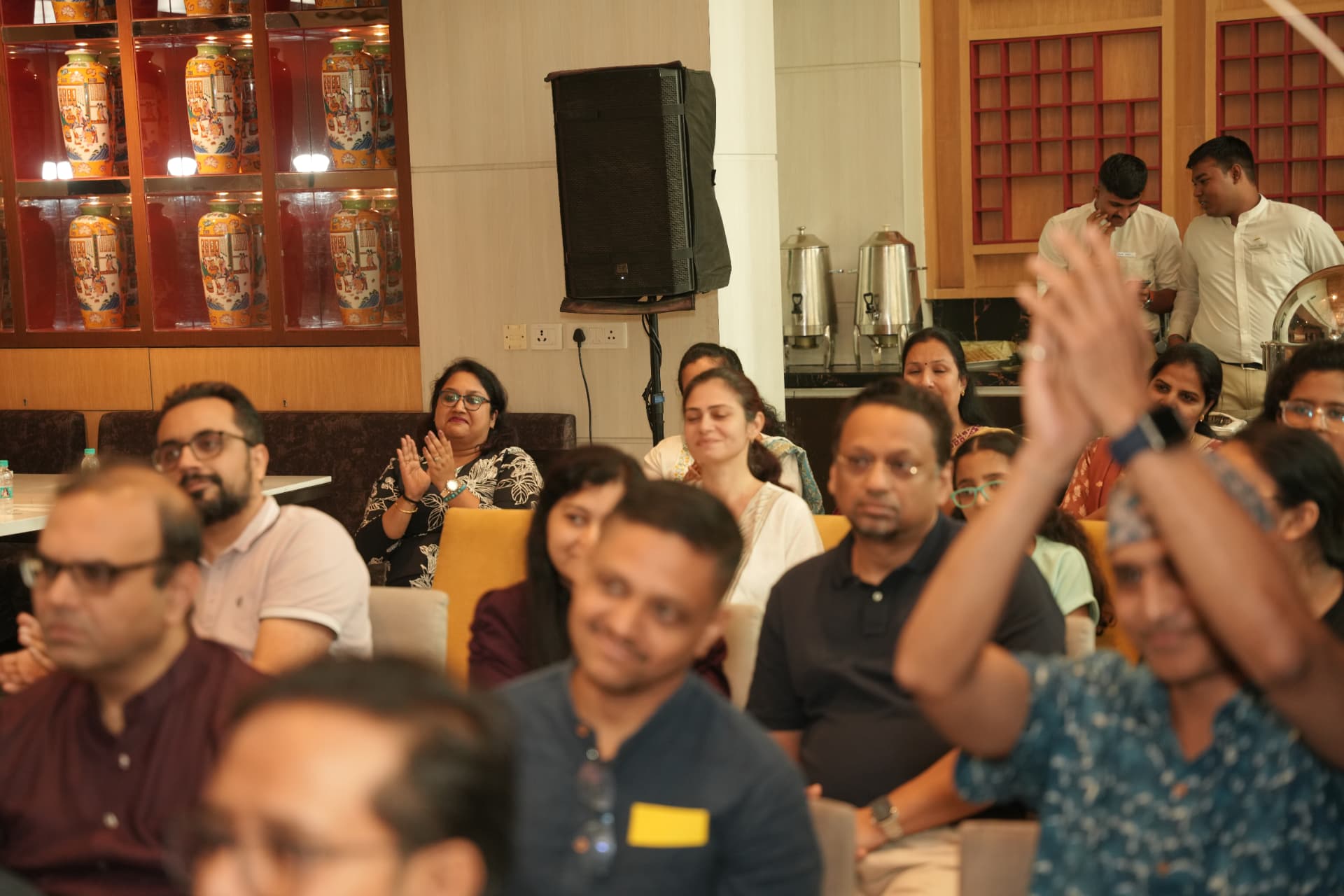 Cheers and applause from a delighted audience.